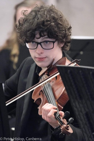 Alex Monro playing in ACT Youth Orchestra's Best of British - from Walton to Winehouse, Finzi to Fab Four, 2021, directed by Rowan Harvey-Martin.