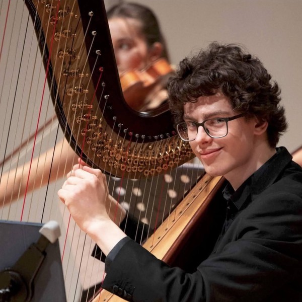 Alexander Monro playing a harp concerto with Canberra Symphony Youth Chamber Orchestra in a concert, 2024. Photo by Peter Hislop