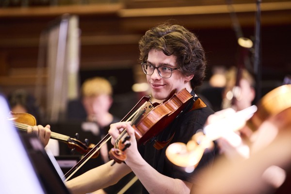 Alex Monro playing in Australian Youth Orchestra's (AYO) National Music Camp, Bishop Orchestra, 2025. Photo by Claudio Raschella