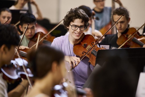 Alex Monro playing principal viola in Australian Youth Orchestra's Alexander Orchestra at National Music Camp 2026, photo by Claudio Raschella