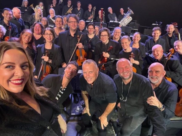 Alex Monro playing viola in the Canberra Symphony Orchestra's 'Symphony in the Park' in Feburary 2026