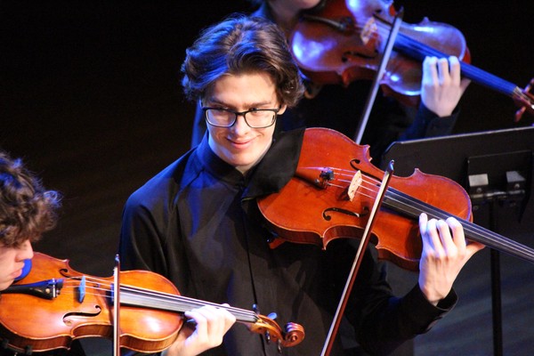 Alex Monro playing viola in the Australian Youth Orchestra's Momentum Ensemble 'Beautiful Equations' in March 2026, photo by Geraldine Cardozo